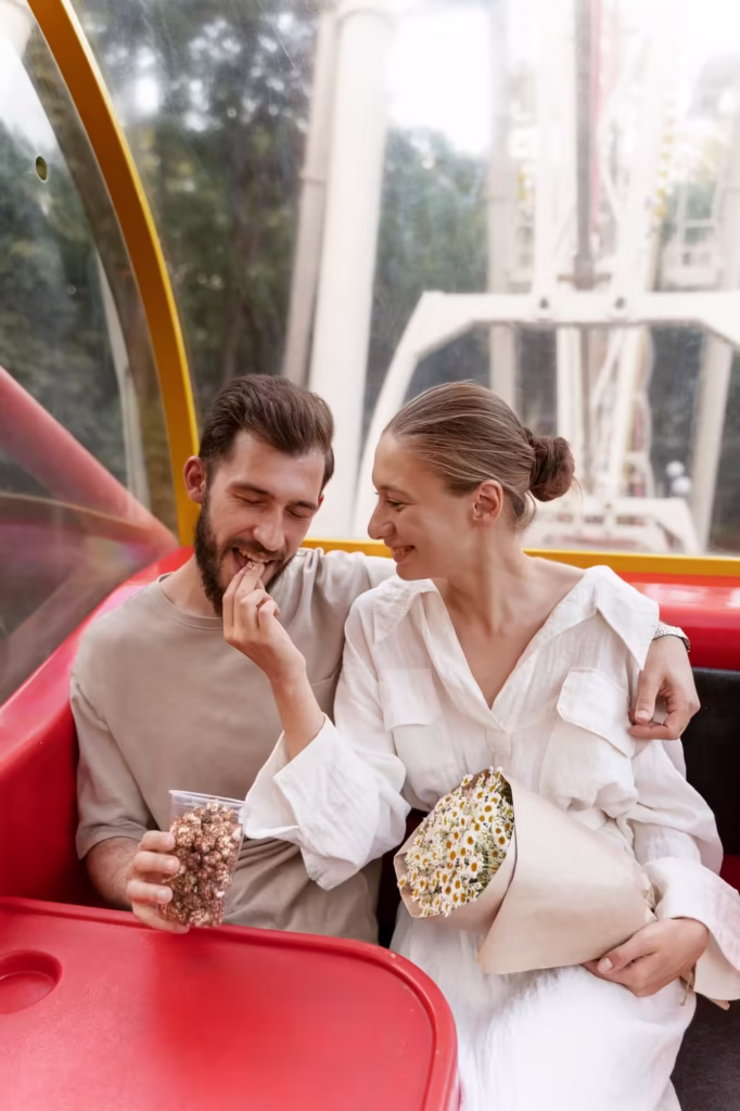 Couple romantique ensemble grande roue
